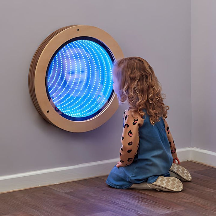 TTS Light Up Circular Infinity Mirror with LED infinity tunnel effect, a visual sensory light for sensory rooms, therapy spaces, and calm corners