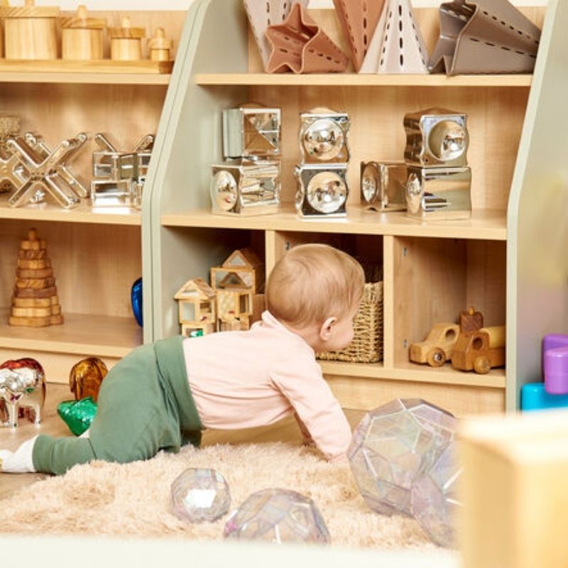 TTS Elements Toddler Shelving Unit with Compartments in an early years classroom, demonstrating child-height access and resource organisation for daycares and schools