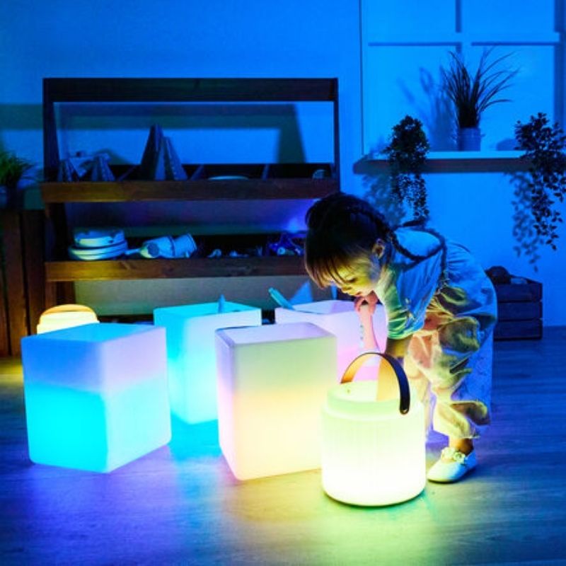 TTS Glow Cube filled with messy play materials, demonstrating the waterproof construction and contained interior play space of H15.5 x W20 x D20cm