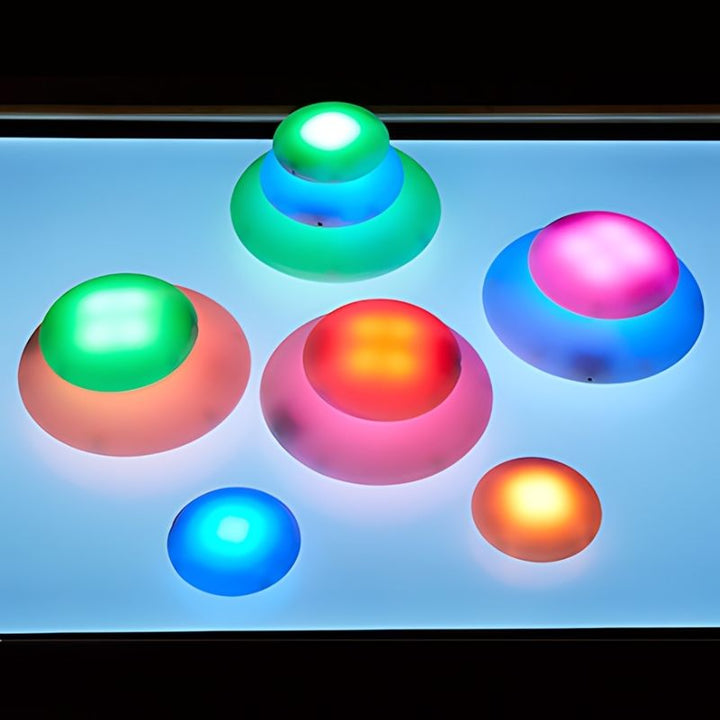 TTS Glow Rollers with docking station from the Sensory ICT Glow Set, showing the rechargeable storage system that keeps sensory resources ready for use