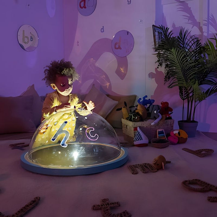 TTS Immersive Projector front view showing child engaged in active sensory light and shadow play in indoor setting