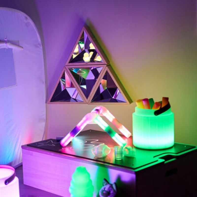 Close-up detail of the TTS Kaleidoscope Mirror faceted surface showing purplish-green light reflections for visual sensory stimulation