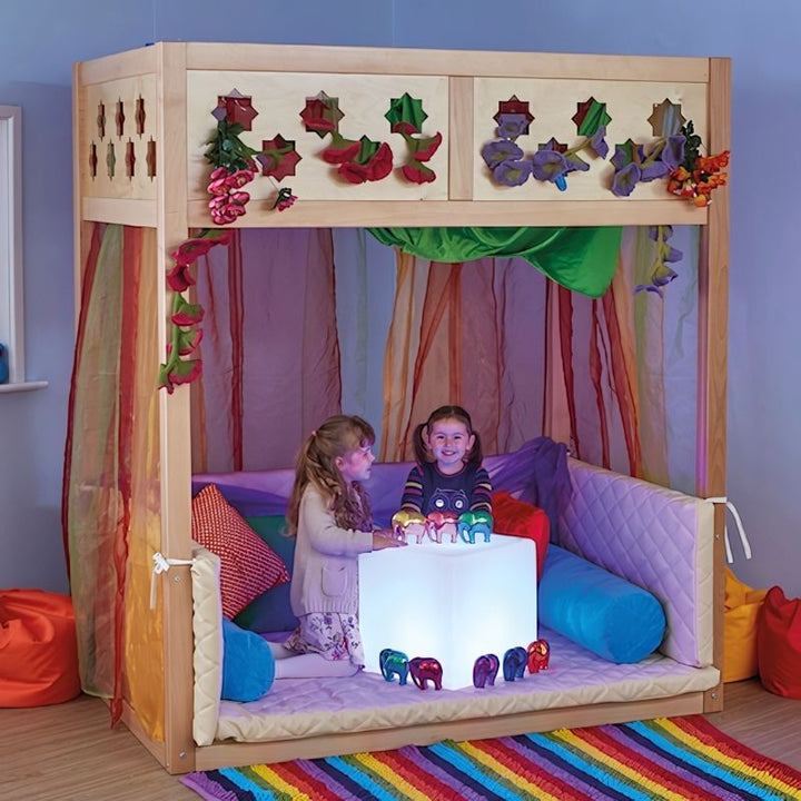 TTS LED Colour Changing Cube used in collaborative sensory play, illustrating the cube's dual role as a mood light and sensory furniture piece