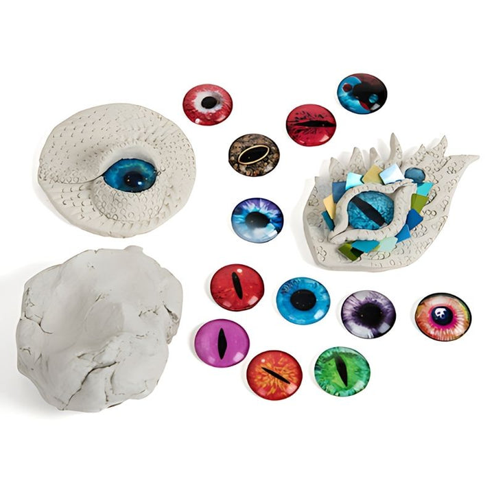 Multiple eye drawings on TTS Light Panel Messy Play Protective Cover, illustrating creative sensory mark-making supported by illuminated light panel play