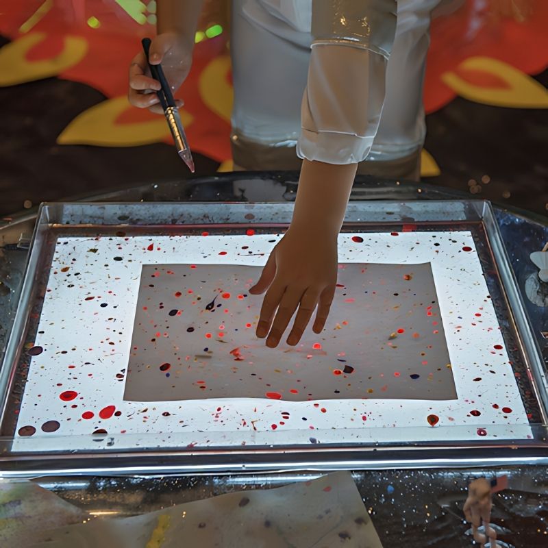 TTS Light Panel Messy Play Protective Cover 4pk shown from above, a clear plastic tray accessory for wet and dry sensory play on TTS light panels