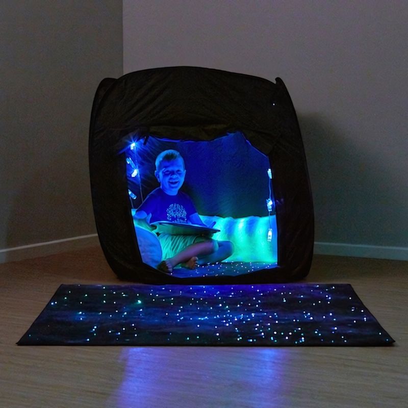 TTS Mini Pop-Up Sensory Pod with child inside, a portable dark-den sensory regulation space for home and classroom use