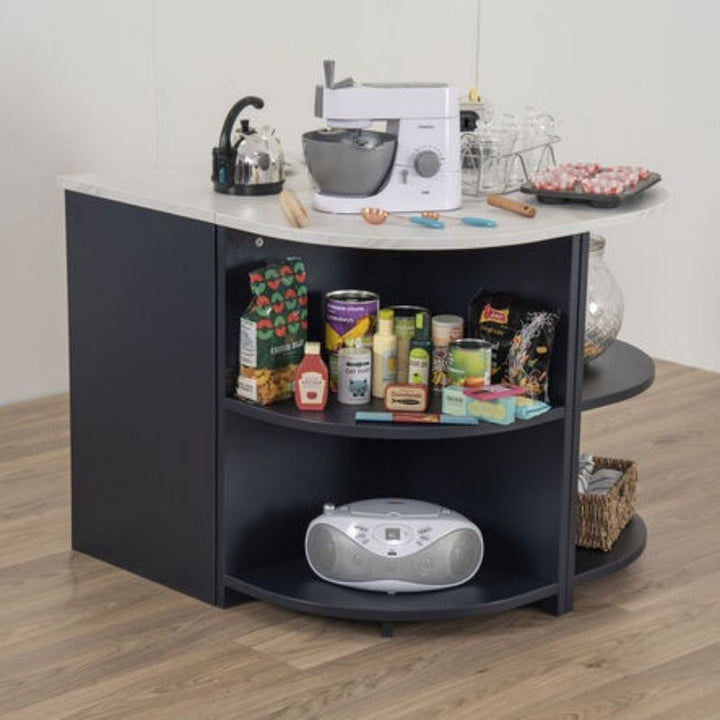 TTS Modern Living Kitchen Island Set in navy, showing open lower shelving stocked with role play groceries and a marble effect worktop set with play kitchen accessories