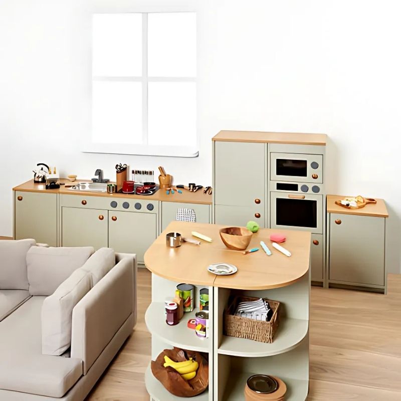 TTS Modern Living Kitchen Island Set in sage, a wooden role play kitchen with modern wood effect worktop, shown in an early years indoor setting
