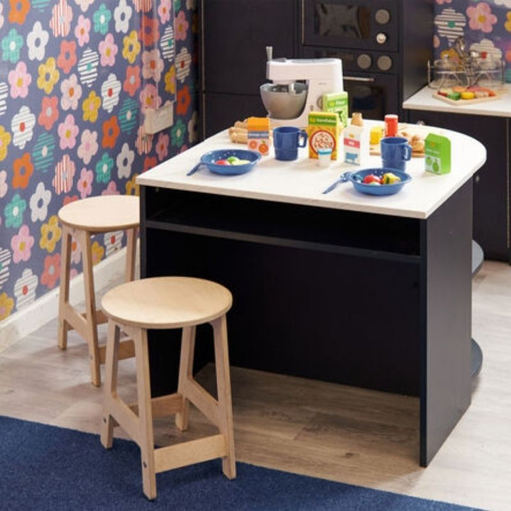 TTS Modern Living Mini Kitchen Stools positioned in an indoor early years setting alongside the Modern Living play kitchen range