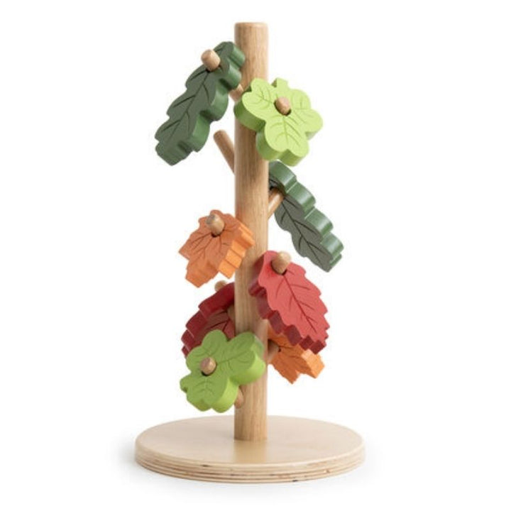 Full view of the TTS Outdoor Posting Tree with eight tactile seasonal leaves in green and orange tones for sorting and posting play
