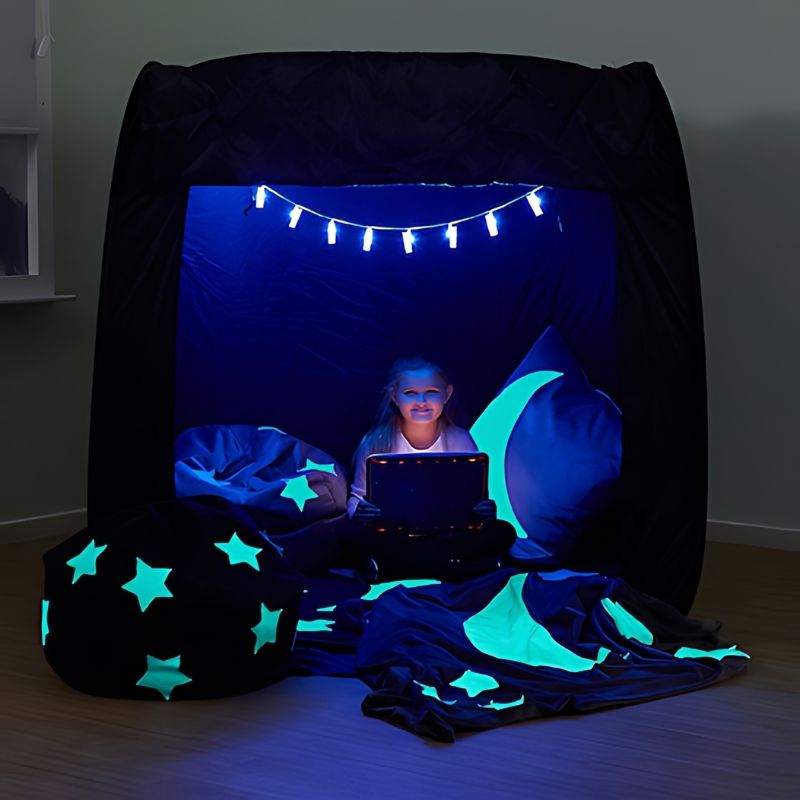 TTS Pop-Up Sensory Space in black with a child playing inside, a portable sensory den for home and classroom use