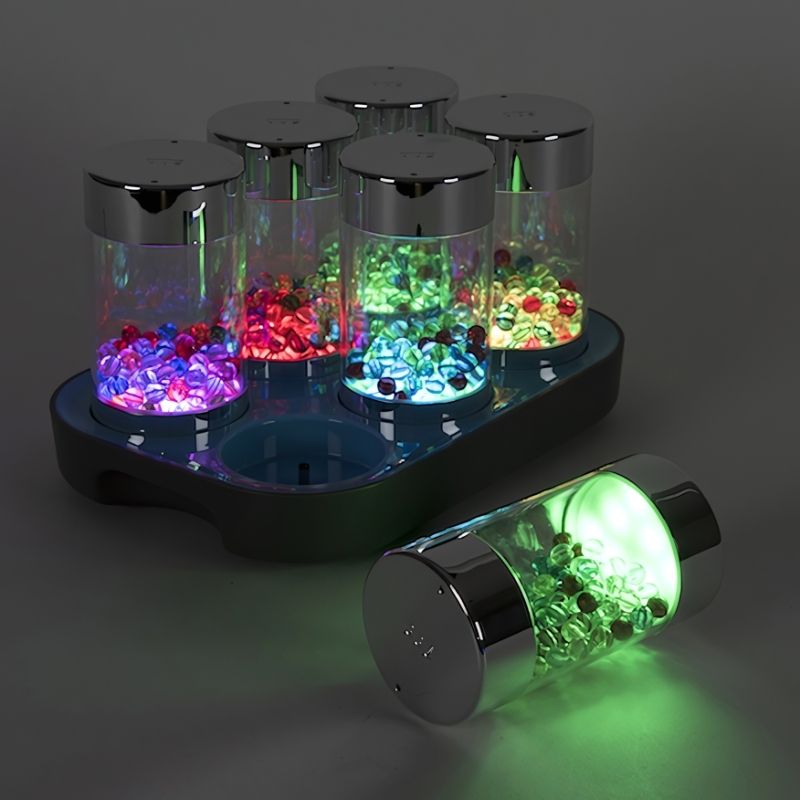 TTS Sensory ICT Glow Set with individual glow pebble component separated, illustrating the rechargeable sensory resources available in the set