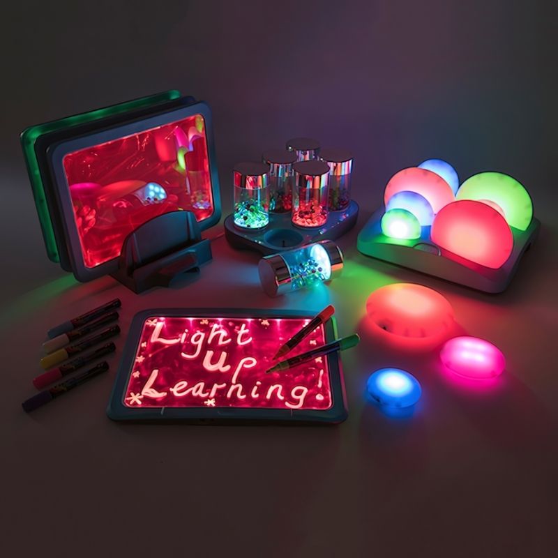TTS Sensory ICT Glow Set full collection overview showing all rechargeable glow pebbles, rollers, and illuminated writing boards for sensory rooms and classrooms