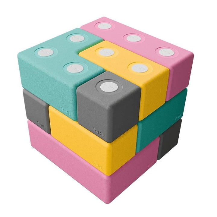 TUKI BIG Magnetic Blocks Builder 12 clean landscape view showing all 12 large 10cm magnetic EVA foam blocks in the full set, the EN71-certified floor building construction set for children, therapy rooms and early years settings across Canada and the US