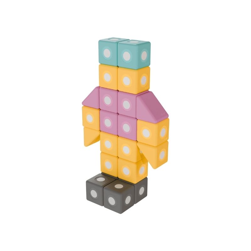 TUKI BIG Magnetic Blocks Builder 128 arranged into a robot figure, showing the maximum construction complexity and multi-section architectural scale that 128 large-format 10cm foam blocks in 8 Signature shapes enables for large-group floor building sessions with 7-10 children