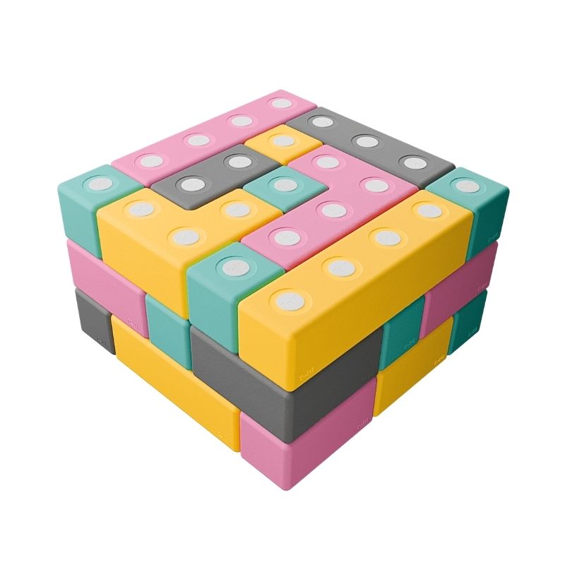 TUKI BIG Magnetic Blocks Builder 43 clean landscape view showing all 43 large 10cm magnetic EVA foam blocks in 8 Signature shapes, the EN71-certified group floor building construction set for 2-3 children in therapy rooms and early years settings across North America