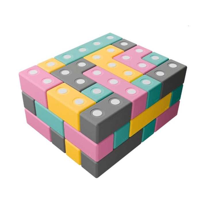 TUKI BIG Magnetic Blocks Builder 56 clean landscape view showing all 56 large 10cm magnetic EVA foam blocks in 8 Signature shapes, the largest BUILDER set in the TUKI BIG range for group floor construction with 3-5 children across North America