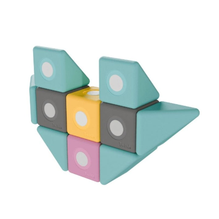 TUKI BIG Magnetic Blocks Builder 76 arranged into a standing figure, showing the open-ended 3D imaginative construction that 76 large-format 10cm foam blocks in 8 Signature shapes enables for group floor building with 4-6 children