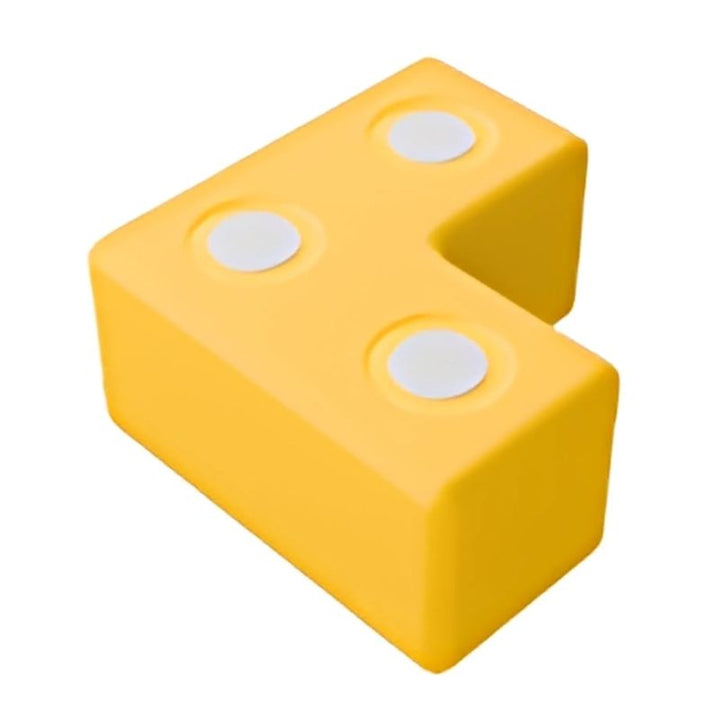 TUKI BIG Magnetic Foam Block yellow L-shape from the Builder 76 large-format group set, one of 8 Signature TUKI shapes in the largest EN71-certified 76-piece BUILDER magnetic foam construction set for groups of 4-6 children