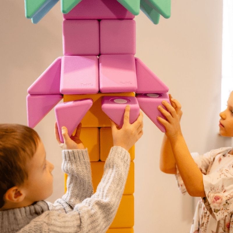 Two children building with TUKI Big Magnetic Foam Blocks Smart 200, showing cooperative play and fine motor engagement with large foam magnetic blocks