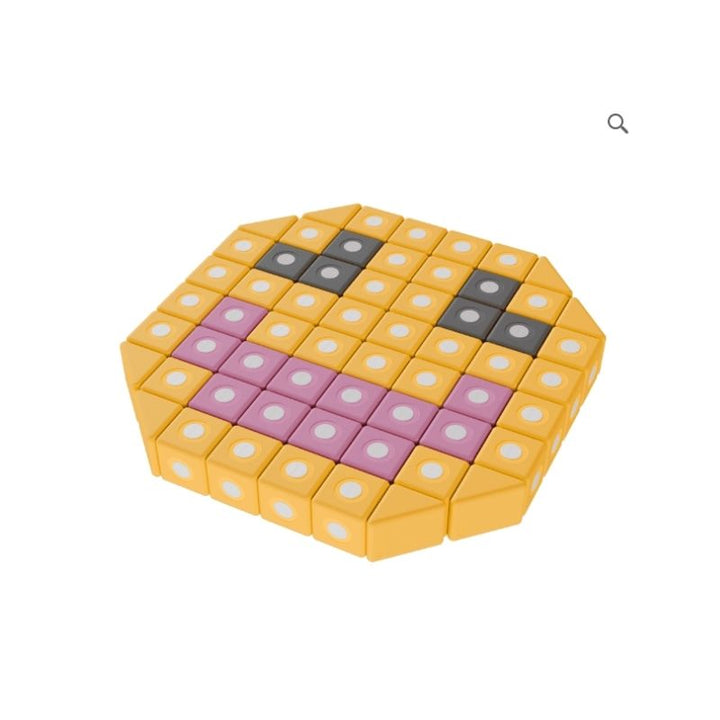 Smiley face figure built with TUKI Big Magnetic Foam Blocks Smart 340, demonstrating creative and imaginative construction using the Smart line's cubes, triangles, and diamonds