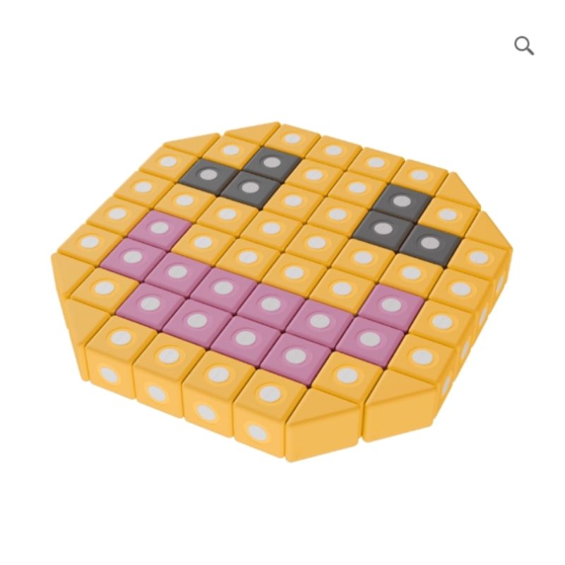 TUKI BIG Smart Magnetic Blocks Smart 10 arranged into a smiley face figure, demonstrating the imaginative 3D construction the 3 Smart shapes including the pyramid enables from just 10 large-format magnetic foam blocks
