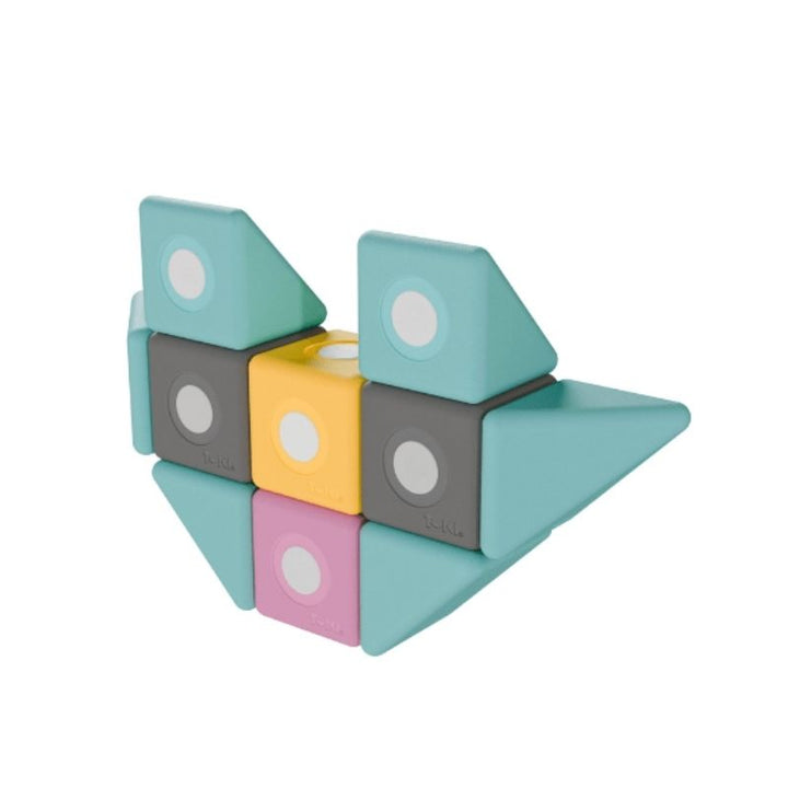 TUKI BIG Smart Magnetic Blocks Smart 30 arranged into a standing figure, demonstrating the open-ended 3D imaginative construction and full-angle rotating neodymium magnet connectivity of the TUKI SMART 30-piece pyramid set