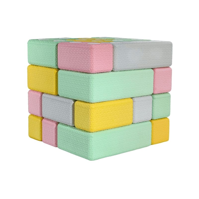 Clean landscape view of the TUKI Regular Magnetic Foam Blocks 26-element set showing all blocks in turquoise, grey, yellow and pink including the 7 Regular TUKI shapes and storage box