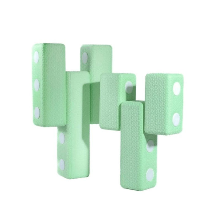 TUKI Regular Magnetic Foam Blocks arranged into a standing figure, showing the modular 3D construction and spatial reasoning play enabled by the 26-element neodymium magnetic block set