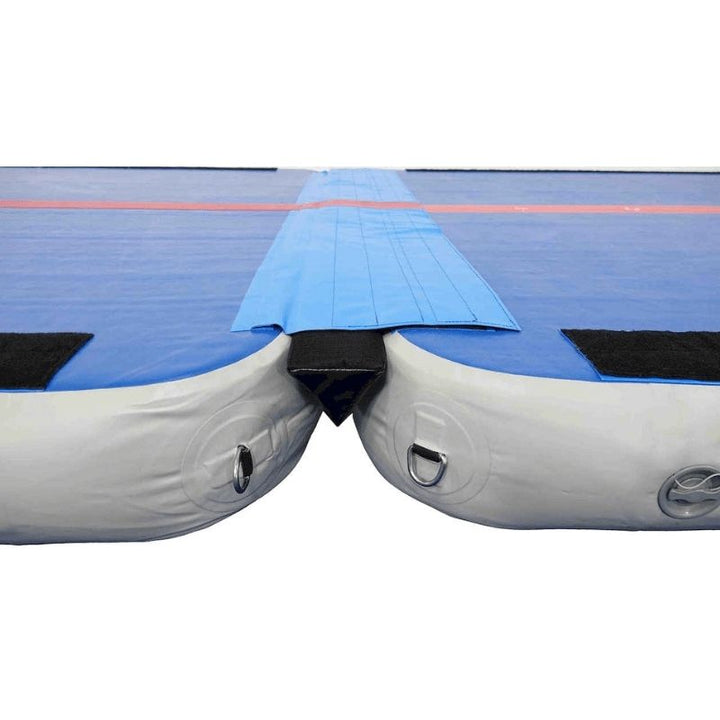 Tumbl Trak Air Floor PRO with the included carrying bag showing the deflated and rolled storage configuration, demonstrating the portable inflatable gymnastics air track's compact storage and transport capability