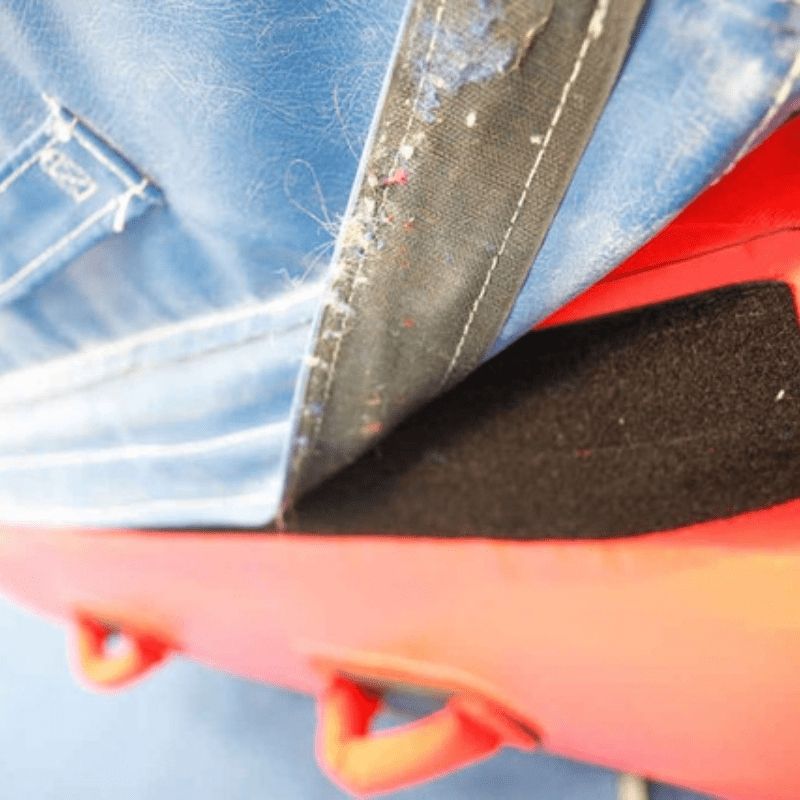 Close-up of the 4-inch non-skid material around the perimeter of the Tumbl Trak Air Platform Mat base, showing the anti-slip construction for safe use on hard gymnasium and therapy room floors