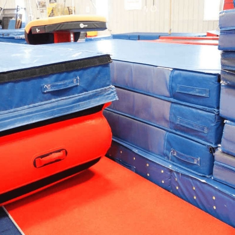 Close-up of the 2-inch loop Velcro perimeter on the top surface of the Tumbl Trak Air Platform Mat, showing attachment points for Tumbl Trak training aids and teaching accessories