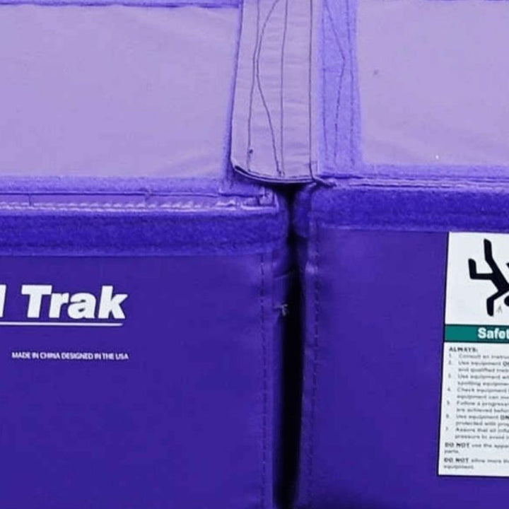 Close-up detail of the Tumbl Trak Booster Block showing the loop Velcro top edges and hook Velcro side construction used for secure side-by-side, end-to-end, and stacked multi-block gymnastics training setups