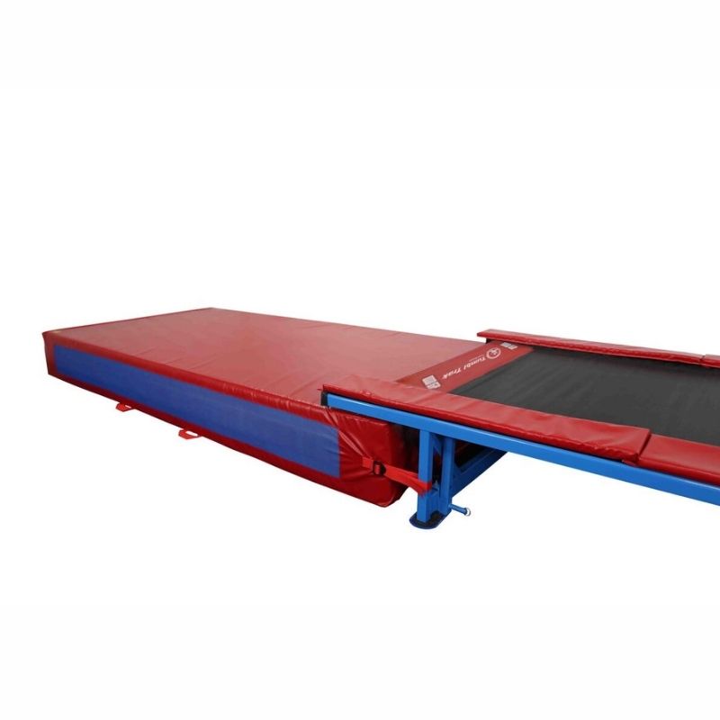 Tumbl Trak Dismount Mat showing the full landscape view of the multi-density foam gymnastics tumbling track landing mat with 18 oz. coated vinyl cover and nylon webbing straps that attach to the Porta Trak, Tumbl Track, and Recreational Track frame