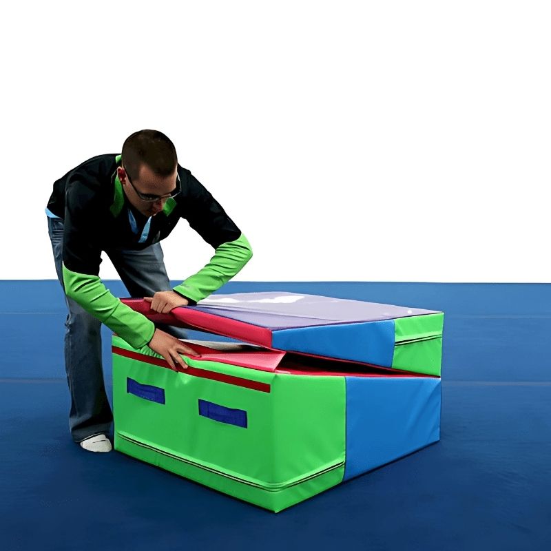 Adult using the Tumbl Trak Folding Incline Mat for movement and conditioning, demonstrating the cheese mat's suitability for users of all ages in home gym and therapy settings