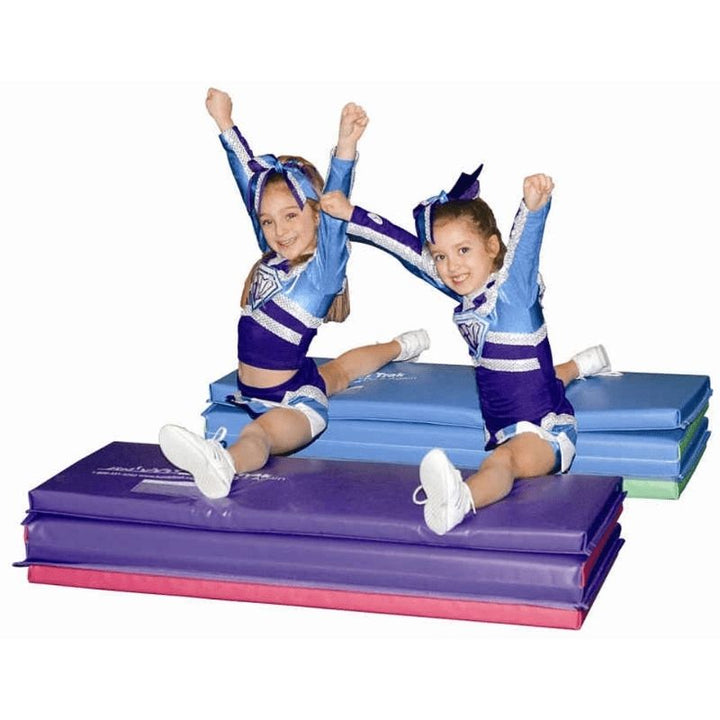 Two young children actively playing on the Tumbl Trak Jack and Jill Mats, demonstrating the 6x4ft surface that accommodates cooperative movement activities and partner play for early childhood motor development