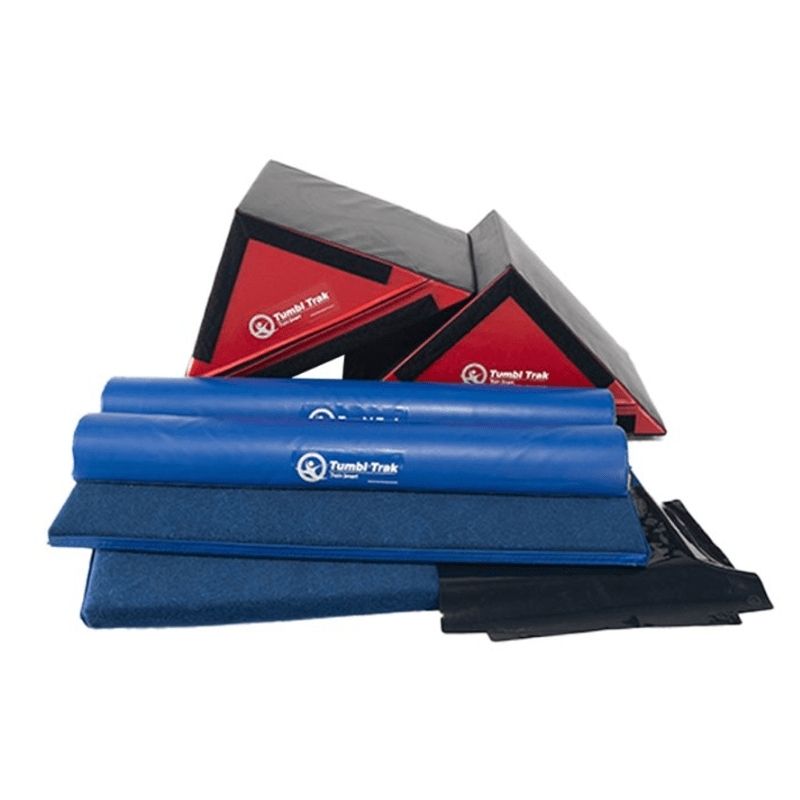 Tumbl Trak Ninja Starter Bundle in red and blue showing the complete 8-piece indoor foam obstacle course set including ninja slants, half rounds, carpet build-a-mats, and non-slip sheets