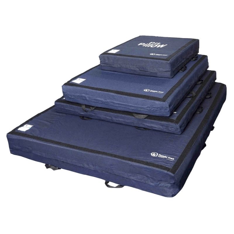 Tumbl Trak Pit Pillow shown in all size and colour variants, displaying the low-density foam gymnastics pit mat with removable washable denim cover available in three sizes for foam pit topper, top mat, and trampoline throw mat use