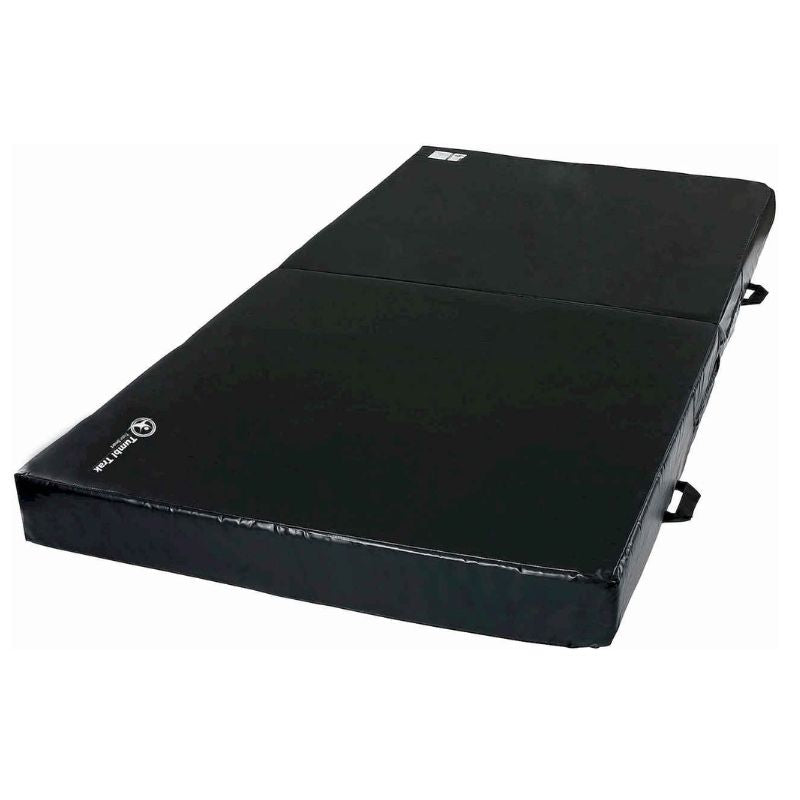 Tumbl Trak Practice Mats in Black second landscape view showing the gymnastics landing mat folded into block shape, demonstrating the fold-in-half Smart Mat Technology feature for drill progressions and compact storage