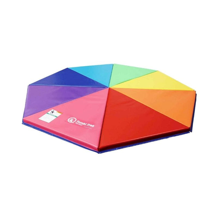 Tumbl Trak Rainbow Pizza Mat assembled as a complete 5-foot diameter circle showing all eight rainbow-coloured pie-shaped foam segments connected via Velcro for gymnastics circle time, group games, and colour-based movement activities