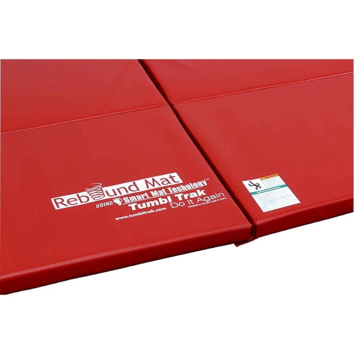 Top-down view of the Tumbl Trak Rebound Mat in Red showing the full 5x10ft surface area of Tumbl Trak's springiest tumbling and stunting mat with dual-layer foam construction for tucks, layouts, and back fulls