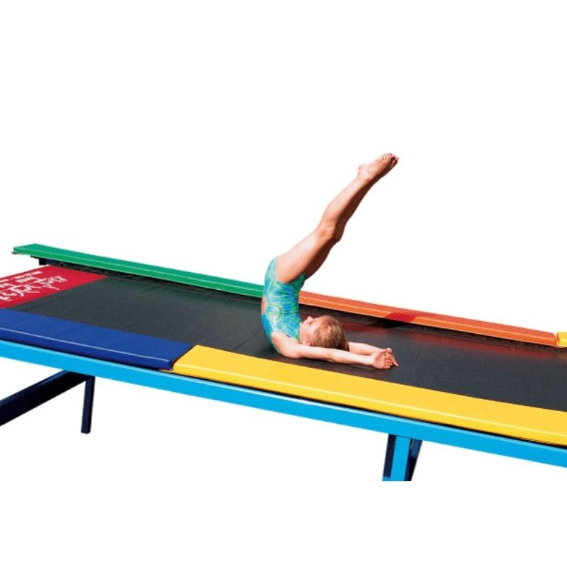 Young girl actively tumbling on the Tumbl Trak Recreational Tumbling Track, demonstrating the soft spring rebound surface designed for gymnasts under 110 lbs in recreational and preschool classes