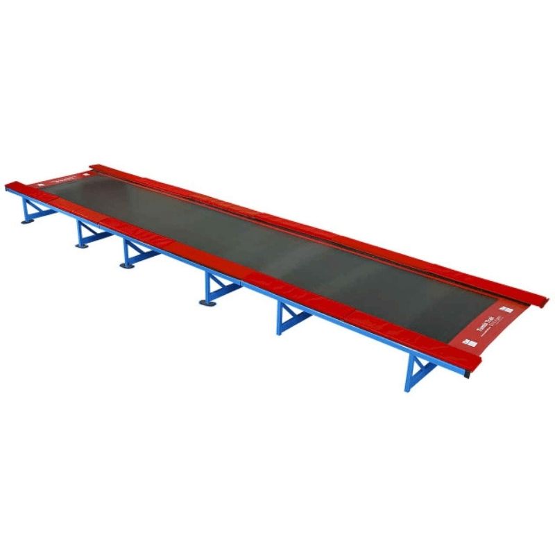 The Original Tumbl Trak gymnastics tumbling track in landscape view showing the full steel frame, polypropylene bed, and 18 oz. vinyl side pads for professional gymnastics and cheer training