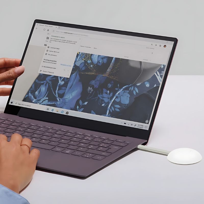 Vibe Tap USB-C wireless adapter plugged into a laptop, showing the plug-and-play connection for instant wireless 4K screencasting to the Vibe Board S1