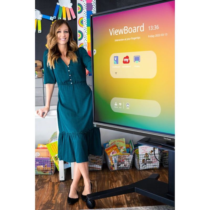 Teacher using the ViewSonic ViewBoard IFP50 Series 4K interactive display for inclusive classroom instruction