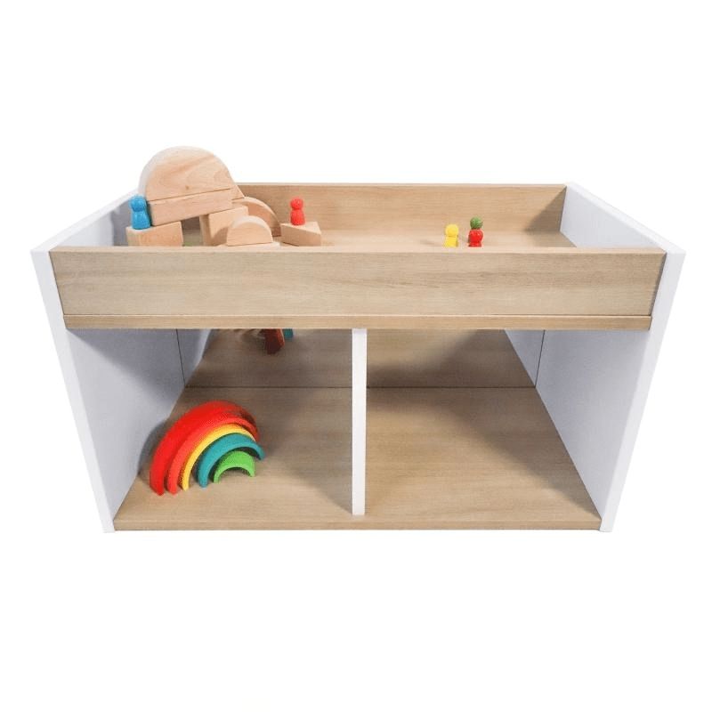 Whitney Brothers elevatED I-See-Me Toddler Mirror Cabinet front view with toys in the 3-inch top storage well, showing the shatterproof mirror face and the contemporary two-tone elevatED design
