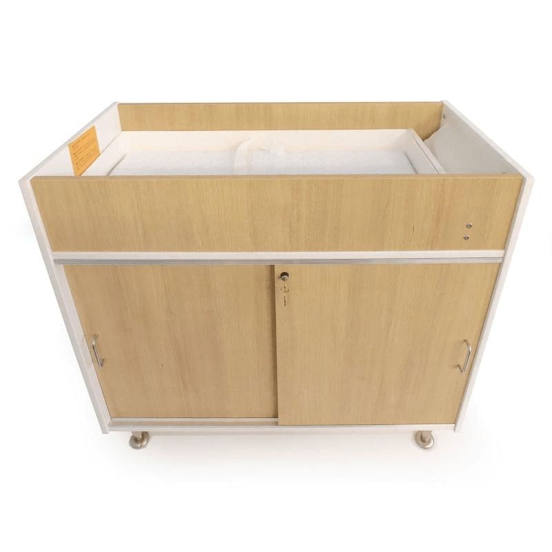 Second clean view of the Whitney Brothers elevatED Infant Changing Cabinet showing the two fixed interior shelves behind the lockable sliding doors and the 7.5" deep changing well