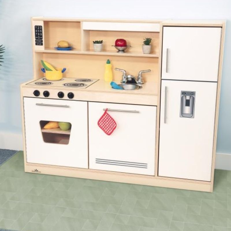 Whitney Brothers Contemporary Kitchen Combo Natural lifestyle view showing the all-in-one compact birch plywood play kitchen in a classroom or home play space setting