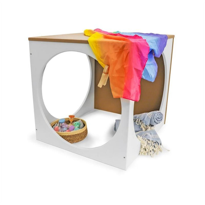 Whitney Brothers outdoorED Play House Cube landscape view styled with props showing outdoor quiet retreat space for preschool reading, self-regulation, and imaginative play