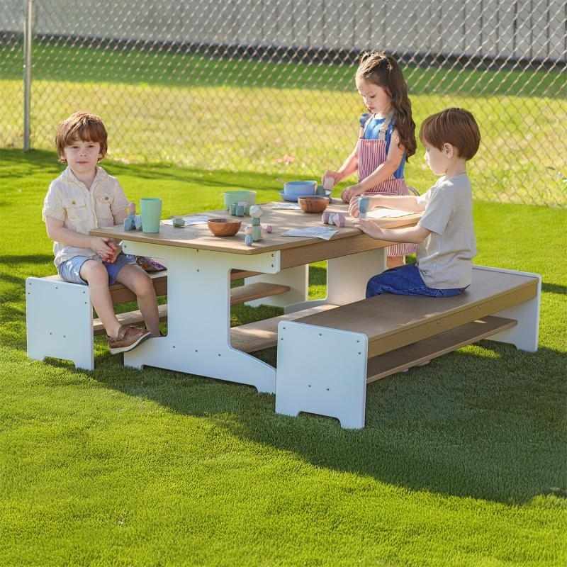 Whitney Brothers outdoorED Table and Two Benches Set with children seated and engaged in group outdoor classroom activity